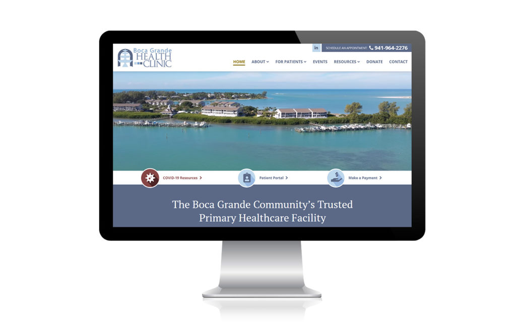 Monitor showing screenshot of the Boca Grande Health Clinic homepage